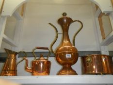 A large copper pot, copper jug, copper kettle and planter