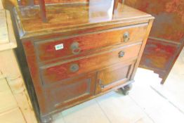 A 2 drawer 2door oak cupboard