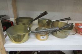 5 Victorian brass saucepans