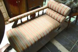 A mahogany inlaid chaise longue