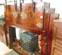 A 1930's fire surround with brass fittings