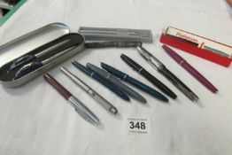 A quantity of fountain pens etc