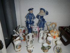 A pair of figures, commemorative and souvenier ware