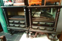 A pair of carved mahogany cabinet with barley twist columns, a/f