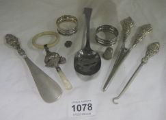 A mixed lot including silver handled glove stretchers, button hook etc