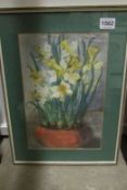 A watercolour of a bowl of dafodils signed G M Jones