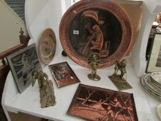 A large copper plaque, 2 smaller plaque, 3 brass figures and 2 other plaques