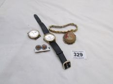 2 wristwatches, a cameo brooch, earrings and bracelet