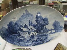 A large blue and white platter