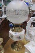 A table oil lamp with globe shade