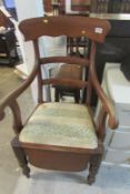 A Victorian commode chair with original liner