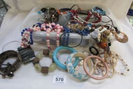 A tray of necklaces and bracelets etc