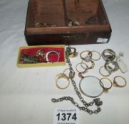 A box of jewellery, mainly rings
