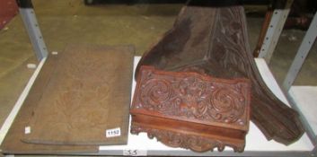 A carved wood shelf, wall pocket and 2 carved panels