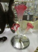 A Victorian cranberry glass epergne (missing 1 trumpet)