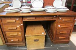 An oak double pedestal desk