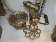 A brass blow lamp, Victorian trivet and planter