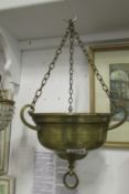 A brass hanging planter presented to Sgt Harry Hemingway R.A.F. who gave his life in Holland, Sept