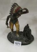 A cold painted spelter Indian figure touch tip lighter