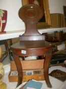 A Victorian mahogany hall chair