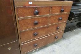 A 2 over 3 oak chest of drawers