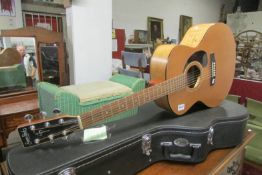 A superb 'Simon & Patrick Luther' accoustic guitar with hard case