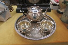 A silver plated tea set on gallery tray