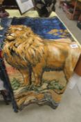 A wall hanging depicting lions
