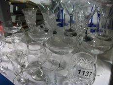 A quantity of glasses including cocktail