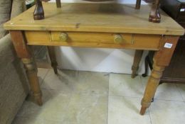 A pine 2 drawer table