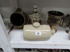 A stoneware lamp base, hot water bottle and 2 other items