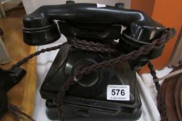 A vintage black telephone