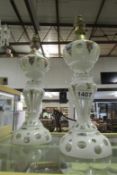 A pair of overlaid cut glass lamp bases