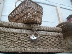 A wicker chest and 2 baskets