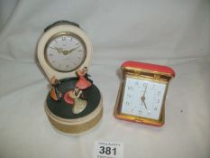 An unusual and rare retro 'record player' alarm clock and a travel alarm
