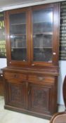 A Victorian mahogany glazed top cabinet