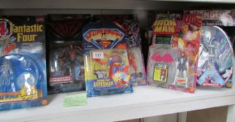A quantity of Spiderman, Marvel legends etc action figures still packaged