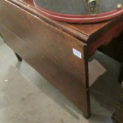 A loom style bathroom stool/linen bin