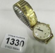 A Marvin wrist watch with gold casing