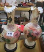 A pair of victorian hand painted ewers