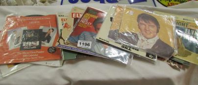 A quantity of Elvis EP records and picture sleeves (some rare)