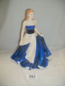 A Royal Doulton figurine 'Olivia' HN5114