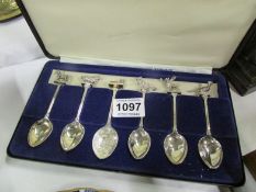 A cased set of 6 silver plated spoons