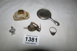 A Netsuke, miner's brooch and 3 other items