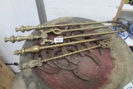 A quantity of fire irons and horse shoes