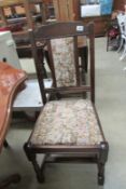 A set of 4 dining chairs with tapestry seats