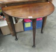 An oak D end table