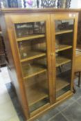 A pine glazed bookcase