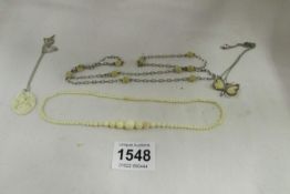 A quantity of bone and ivory jewellery inc silver