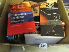 A box of guitar books